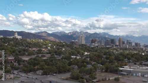 Wide aerial view of Salt lake City and Wasatch Mountains photo