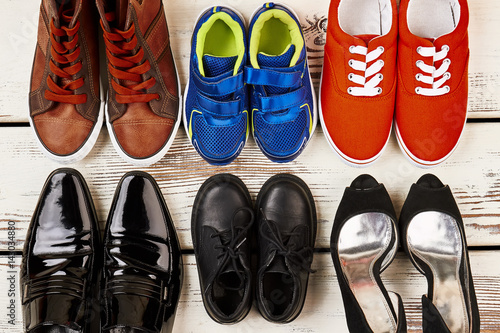 Formal shoes and sneakers. Family set of footwear.