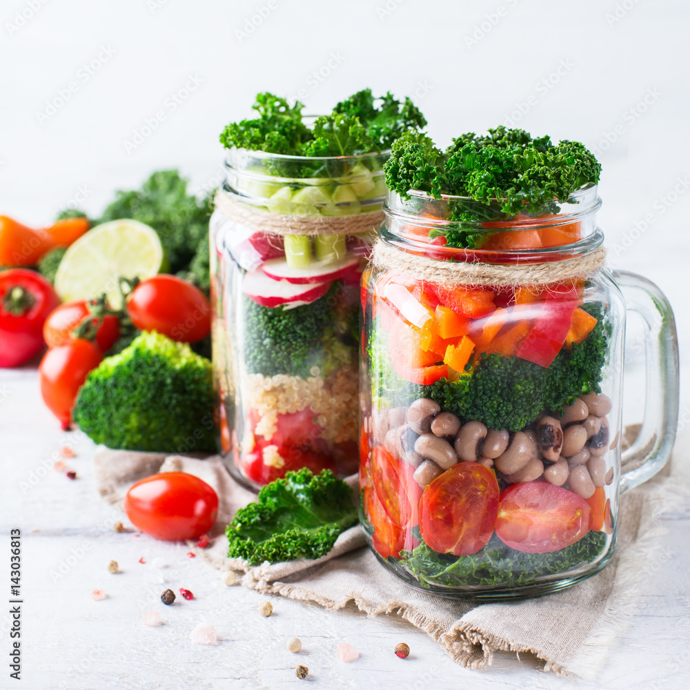 Healthy vegan salad in a mason jar with quinoa Healthy vegan salad in a mason jar with quinoa