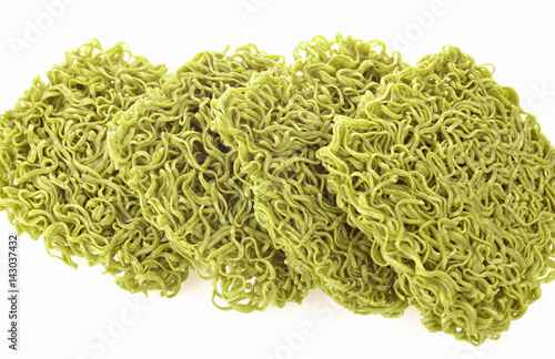 Dried organic noodles on white background