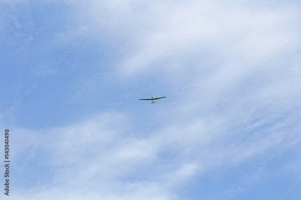 Glider on blue sky