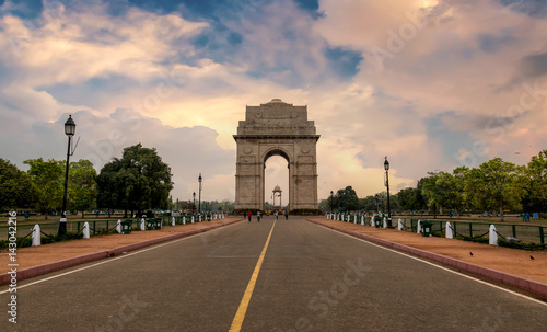India Gate a war memorial built on the eastern end of Rajpath road New Delhi at sunset time. photo