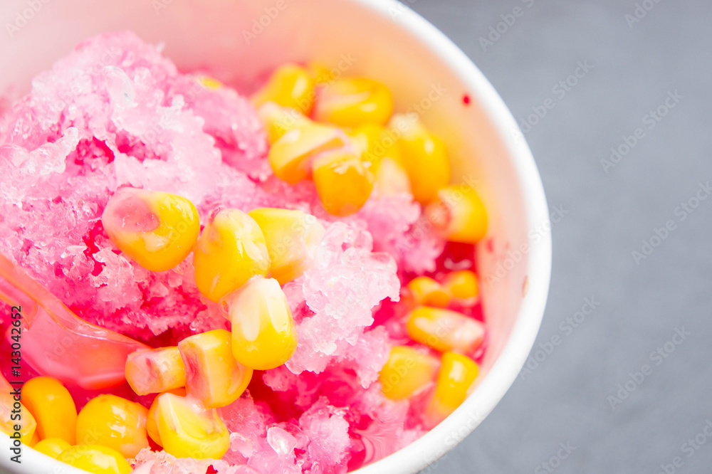 shave ice withe sala flavor and condensed milk and sweet corn , crushed ice refreshing shave ice withe sala flavor and condensed milk and sweet corn , crushed ice refreshing