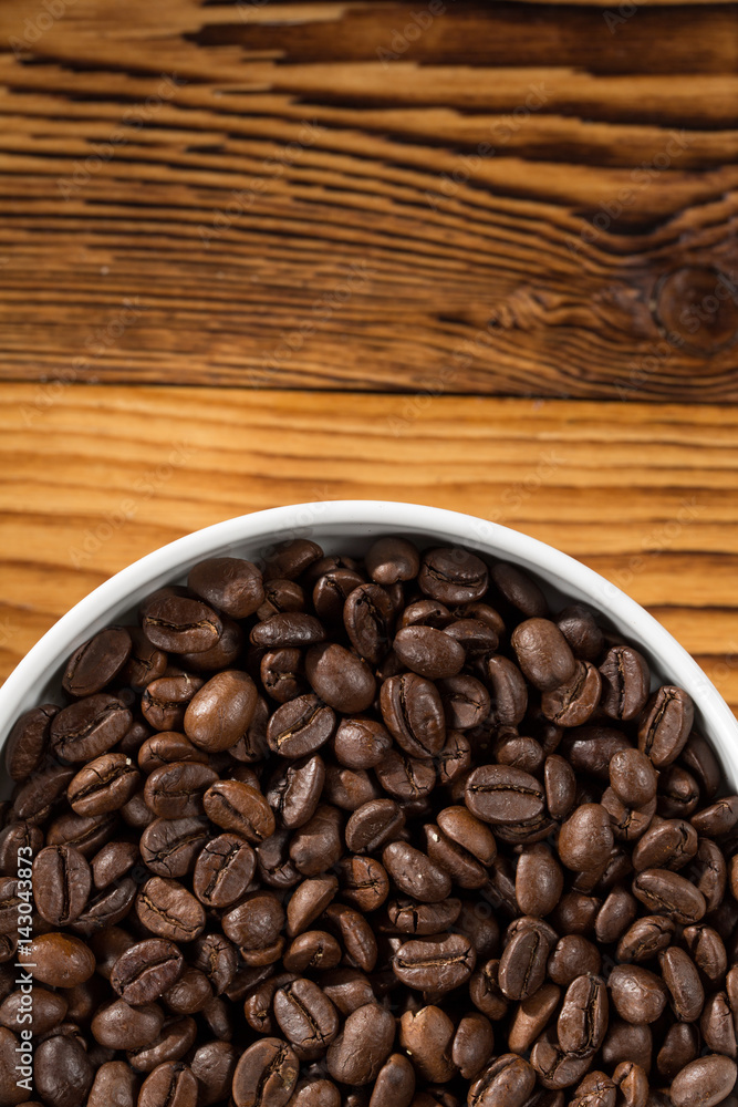 Fototapeta premium Arabic. High angle cropped shot of a bowl full of freshly roasted coffee beans copyspace above.