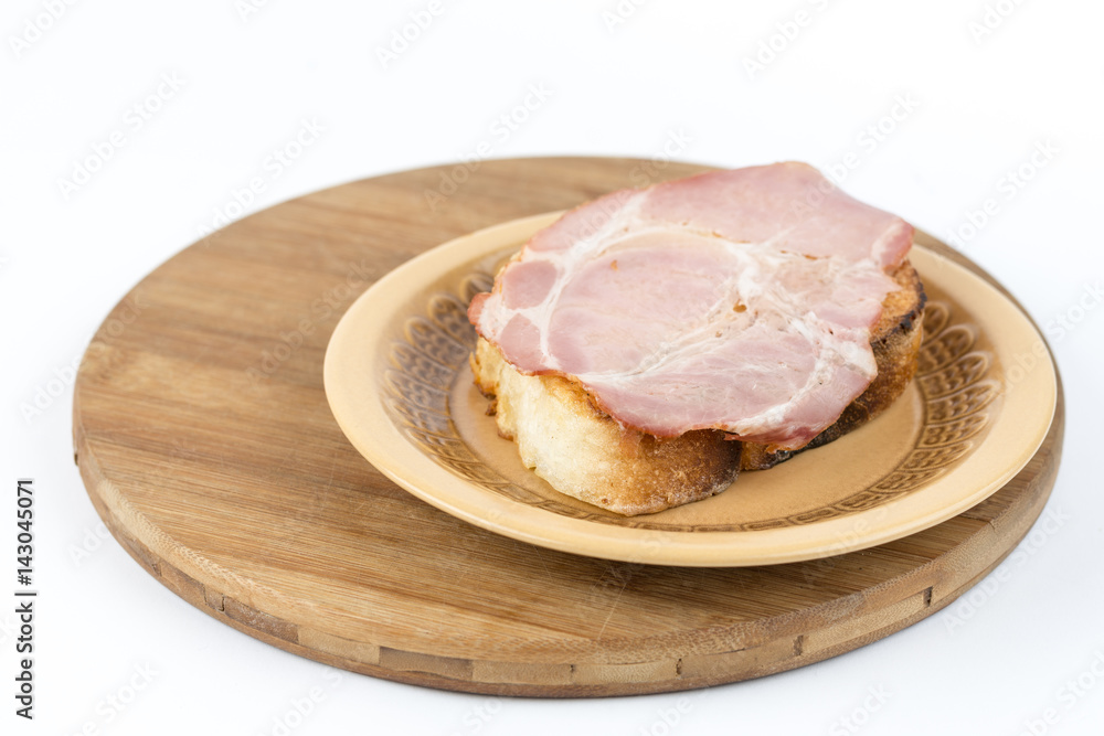 French toast bread on eggs with domestic smoked pork ham French toast bread on eggs with domestic smoked pork ham