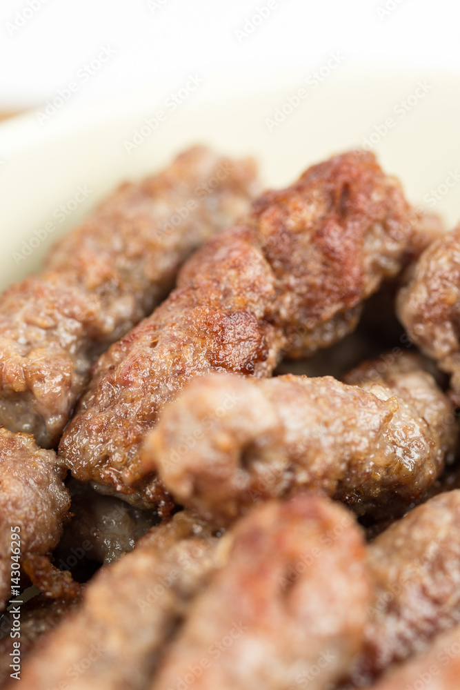 Closeup macro fresh minced meat cevapcici kebabs Closeup macro fresh minced meat cevapcici kebabs