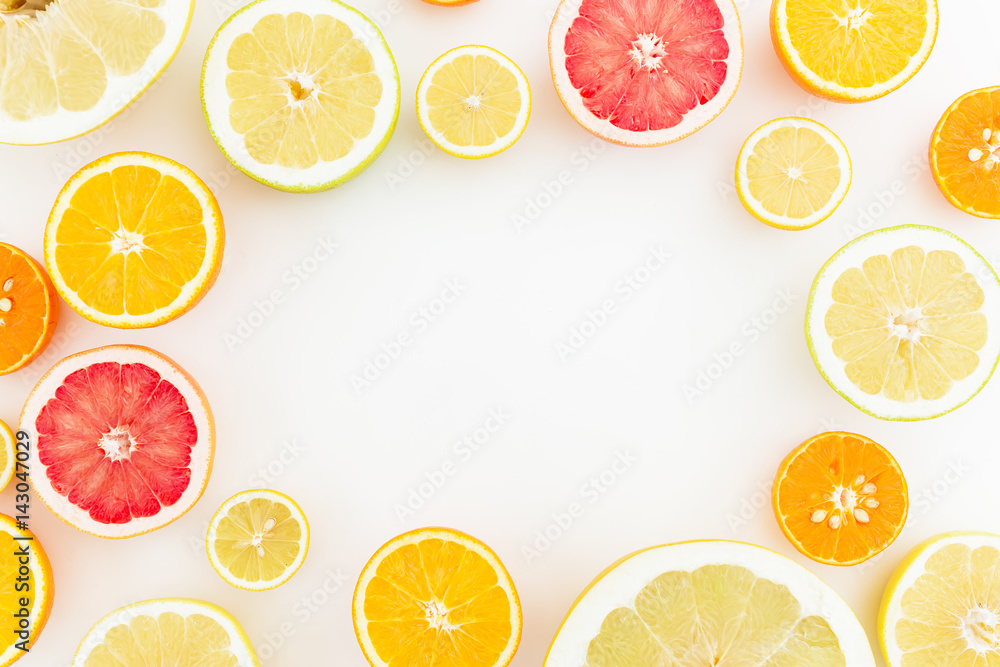Frame of citrus on white background. Flat lay, top view.