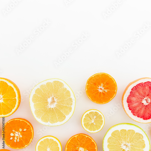 Fruit background. Pattern of citrus on white background. Flat lay  top view.