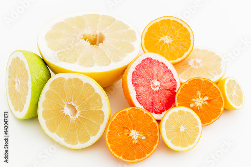 Citrus on white background. Flat lay, top view.