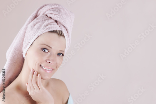 Spa Woman. Beautiful Girl After Bath Touching Her Face. Perfect Skin. Skincare. Young Skin.