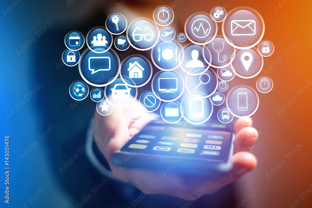 Concept of multimedia icon flying over device on a technology interface - Internet concept Concept of multimedia icon flying over device on a technology interface - Internet concept