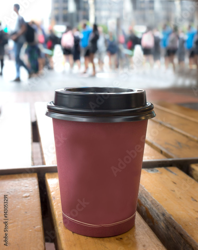 Closeup of a paper plastic coffee cup.