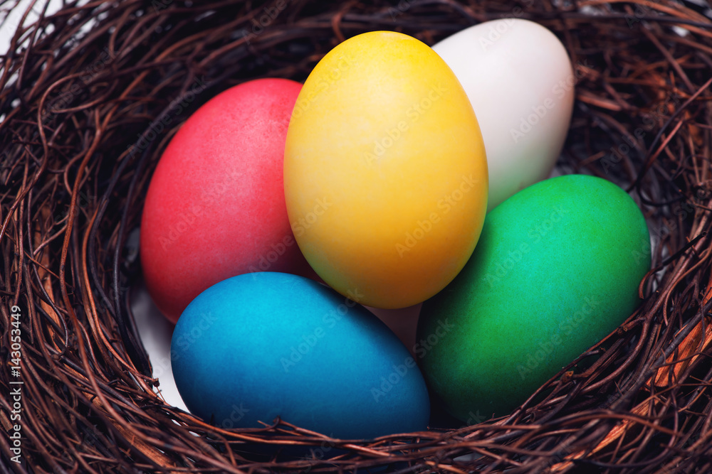 Easter eggs in beautiful nest on marble background. Easter eggs in beautiful nest on marble background.