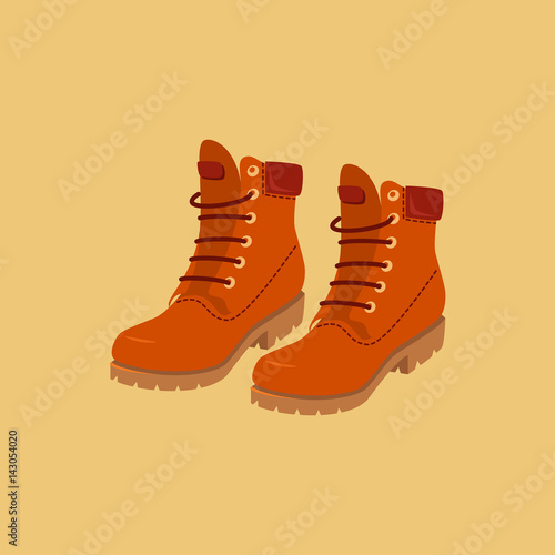 Mustard hiking boots. Vector isolated object.