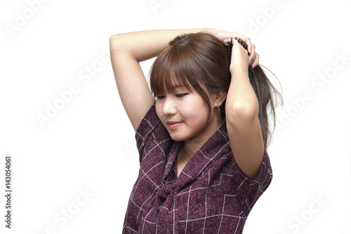 Girl poses bundle on her hair isolate on white background