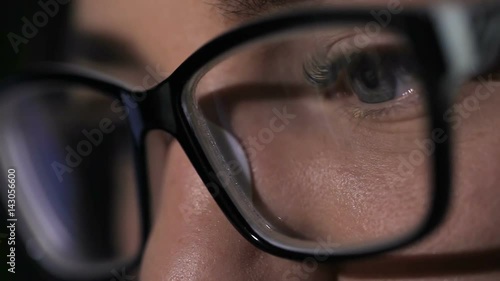 Wallpaper Mural Attractive young woman typing on tablet touch screen. Reflection of tablet in glasses. Torontodigital.ca