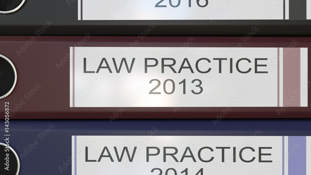 Vertical stack of multicolor office binders with Law practice tags 3D rendering different years Vertical stack of multicolor office binders with Law practice tags 3D rendering different years