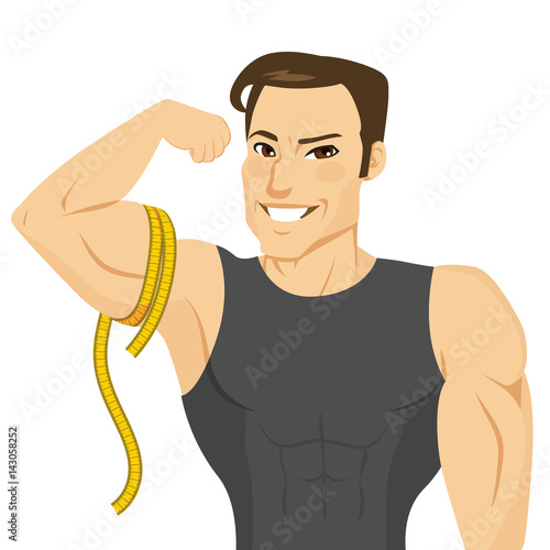Handsome caucasian man flexing arm and measuring it with tape