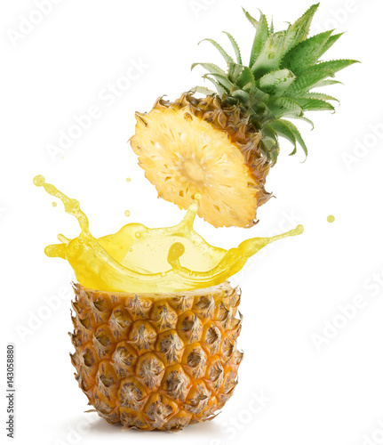 Quadro su tela juice splashing out of a pineapple isolated on white background