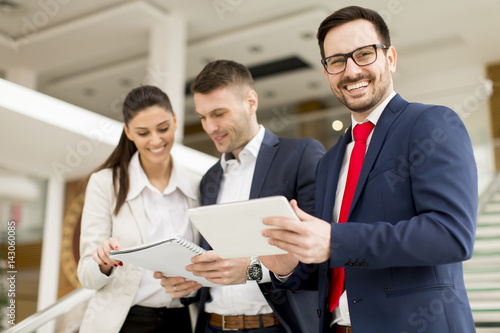 Business people sharing the...