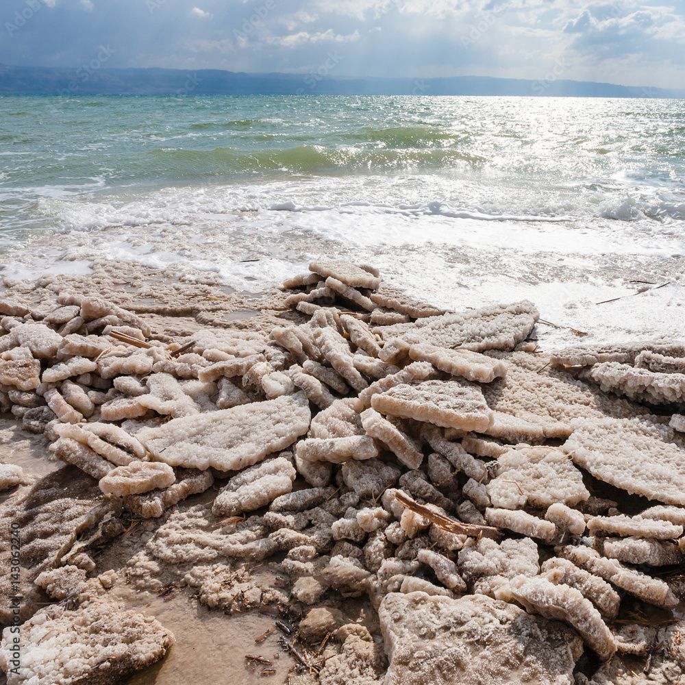 natural salt on shore of Dead Sea in winter natural salt on shore of Dead Sea in winter