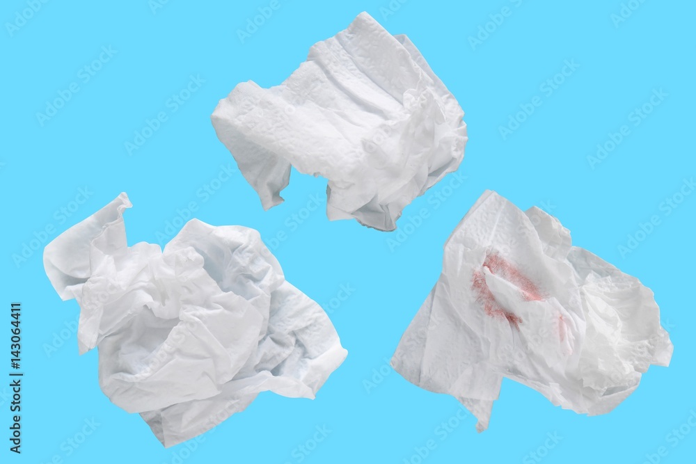 Piece paper tissue white isolated on blue background with clipping path.