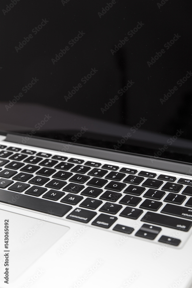 Close up view at laptop with black screen Close up view at laptop with black screen