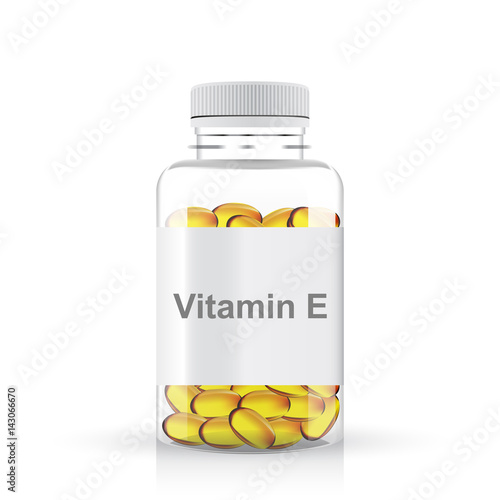Transparent plastic bottle of vitamin e pills, isolated on white