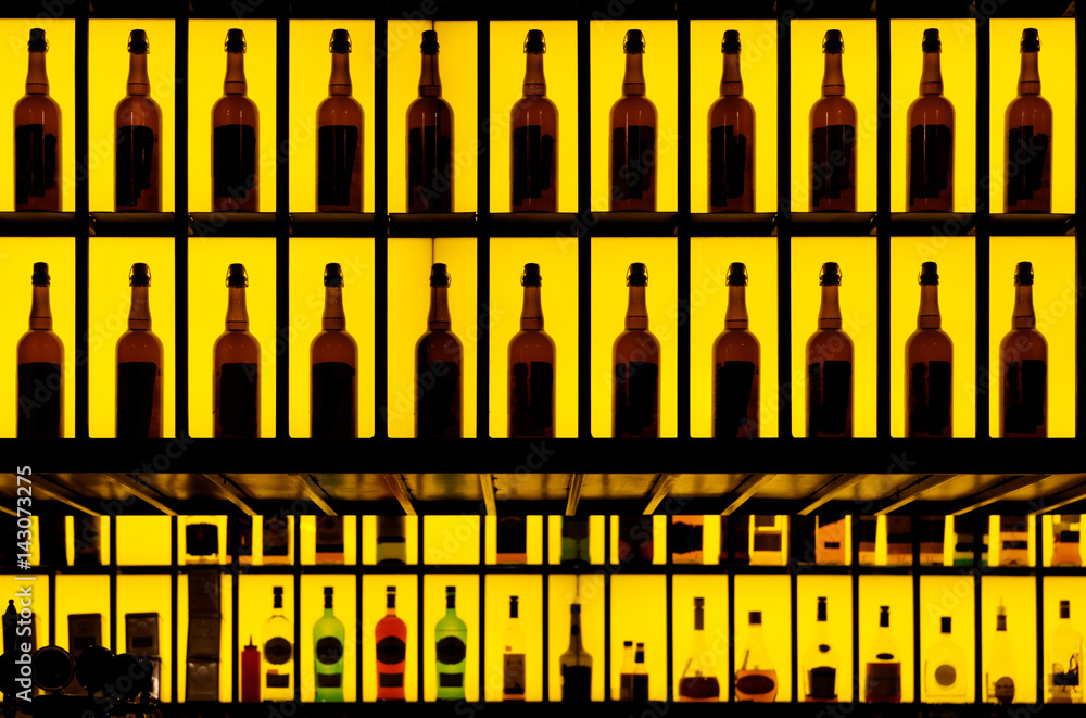Various alcohol bottles in a bar Various alcohol bottles in a bar