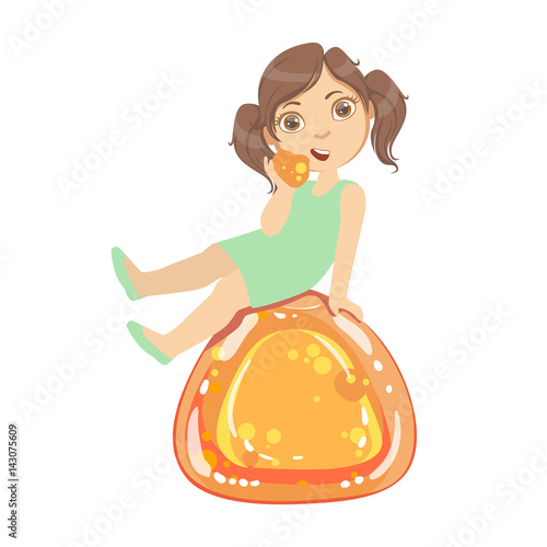 Little girl is sitting on a huge orange jelly andy, a colorful character