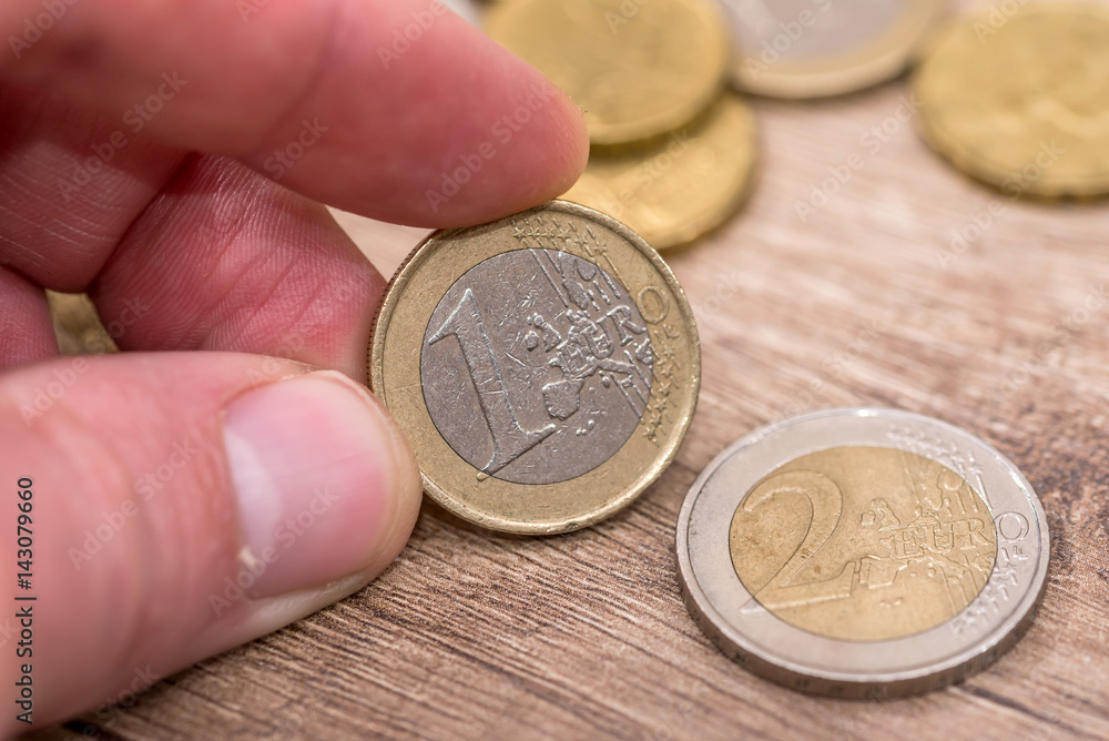 man showing euro coins. close up. monetary. man showing euro coins. close up. monetary.
