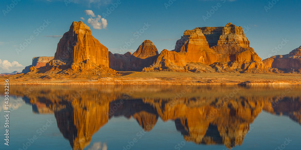 Red Rock Mountain Cliffs with a Lake Reflection
