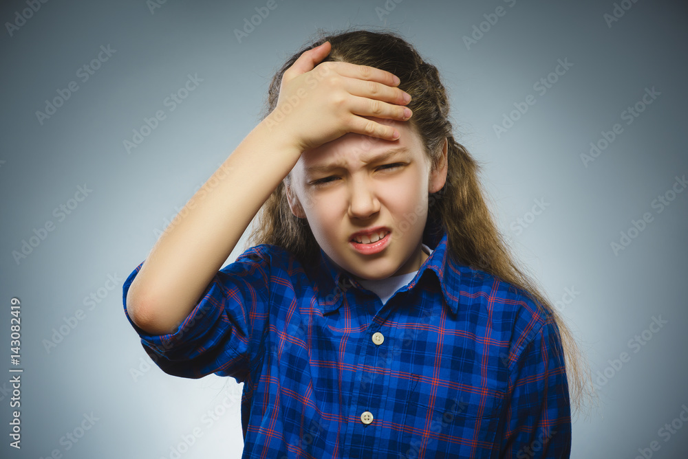 Closeup sad girl with worried stressed face expression Closeup sad girl with worried stressed face expression