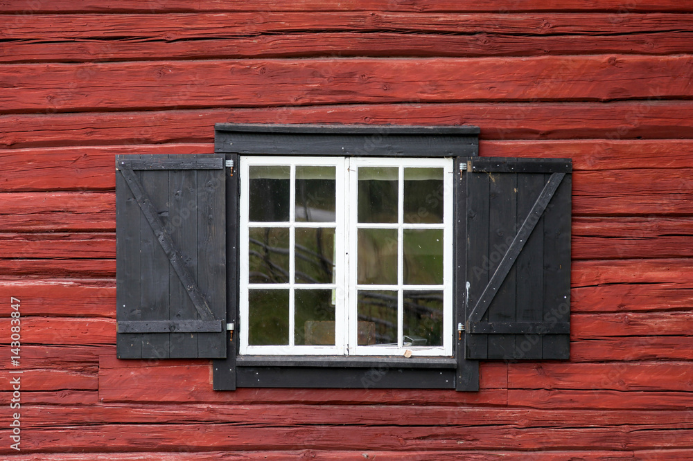 Window on red house Window on red house