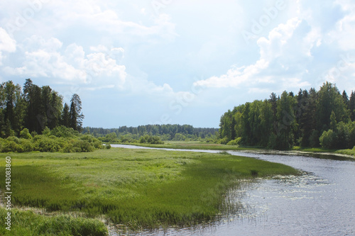Fototapeta Naklejka Na Ścianę i Meble -  Landscape with river, forest, fields and blue sky