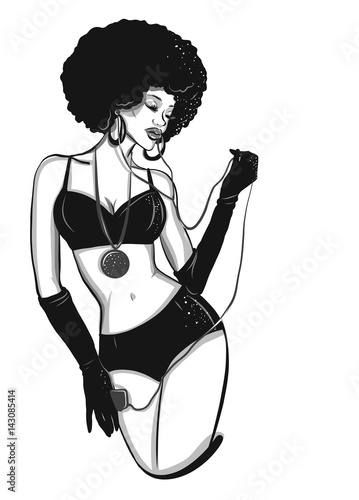 Beautiful afro american woman with headphones listening to music