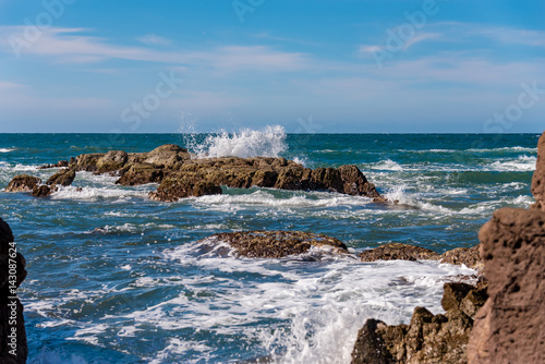 Surf Splasing Into Rocks