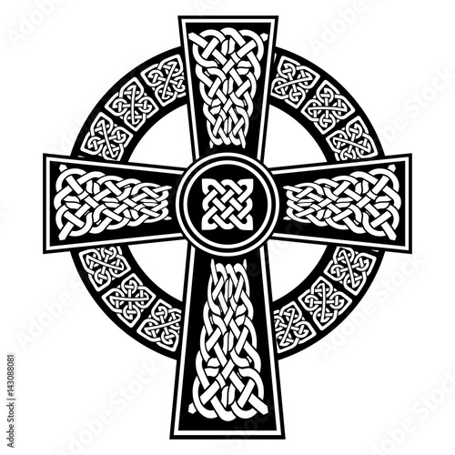 Celtic style Cross with  endless knots patterns in white and black with stroke elements and surrounding black ring  inspired by Irish St Patrick's Day, and Irish and Scottish carving art
