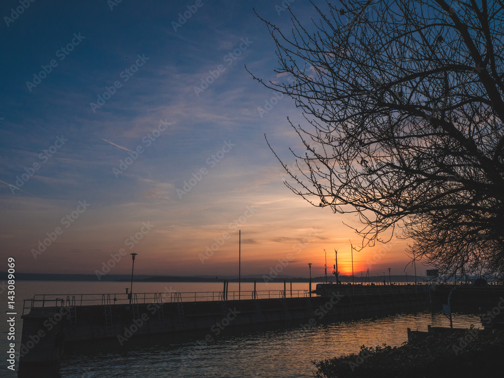 Idyllic Sunset at Lake Constance, Germany Idyllic Sunset at Lake Constance, Germany
