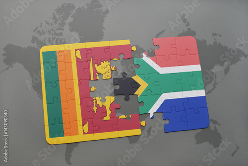 puzzle with the national flag of sri lanka and south africa on a world map