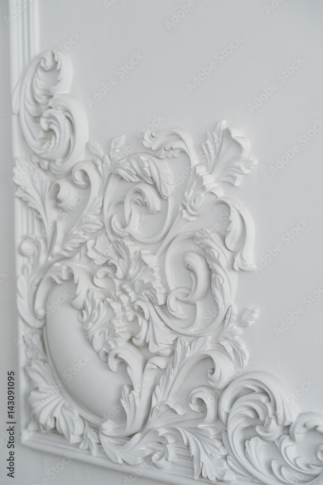Luxury white wall design bas-relief with stucco mouldings roccoco element Luxury white wall design bas-relief with stucco mouldings roccoco element