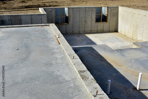 Concrete slab and walls complete, ready for lumber.