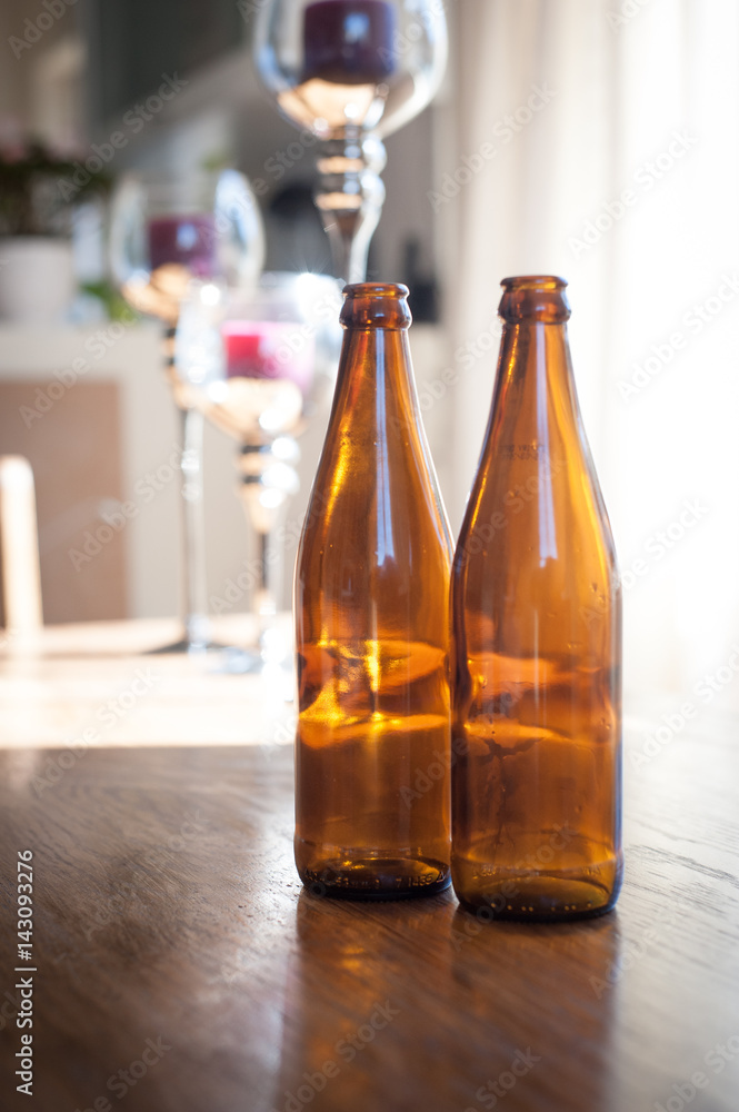 brown glass beer bottles on a table