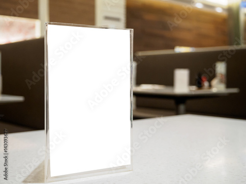 Mock up menu frame on table in the cafe restaurant