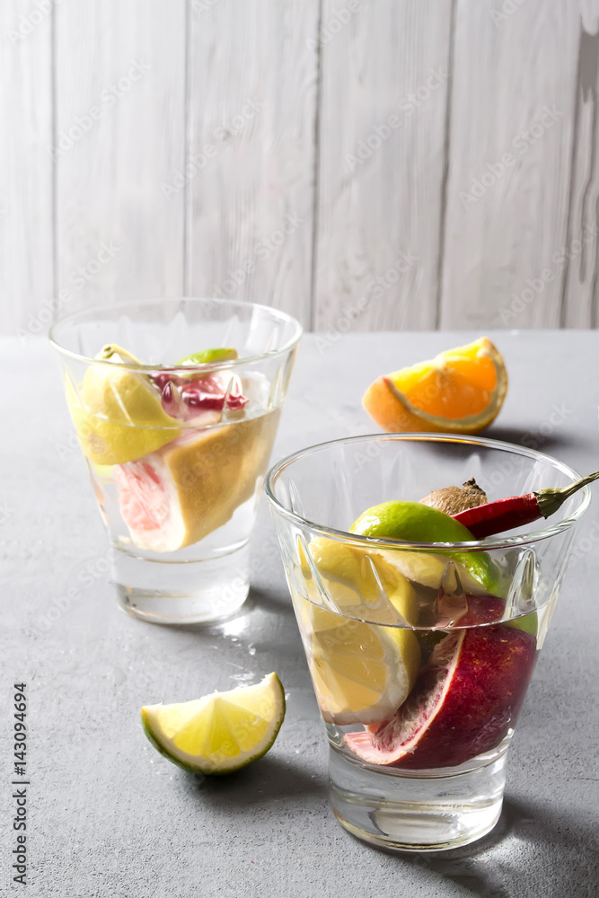 Fototapeta premium Summer soft drink with orange and lime
