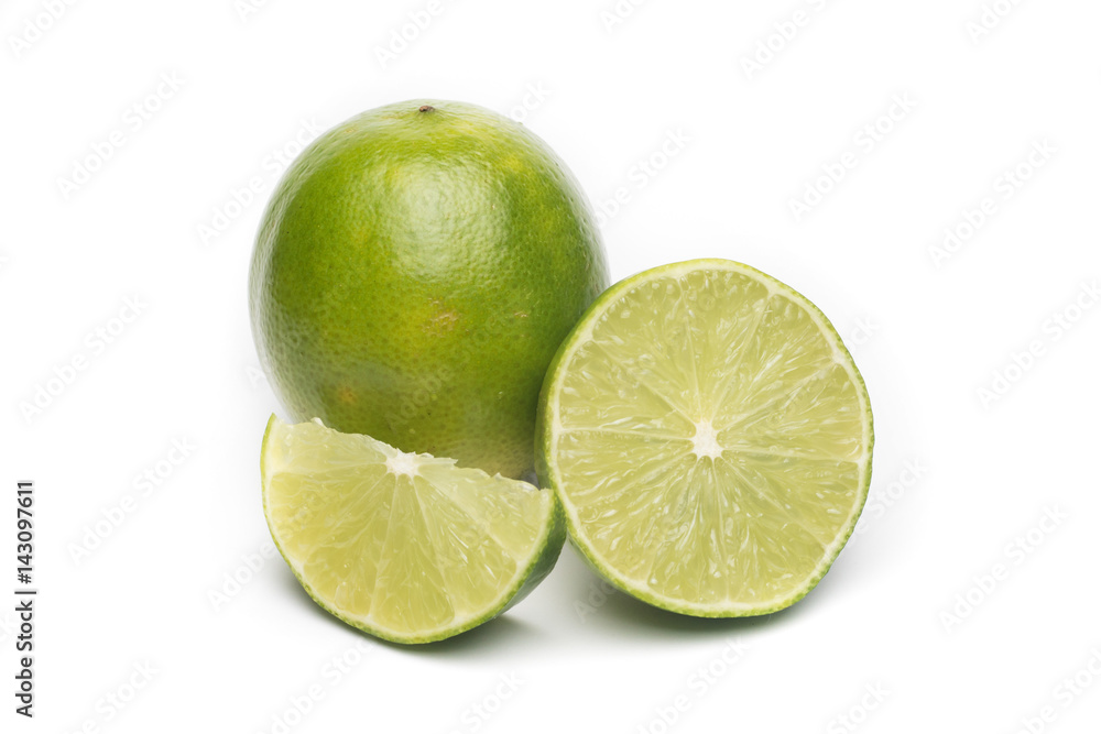 Limes with slices isolated on white background Limes with slices isolated on white background