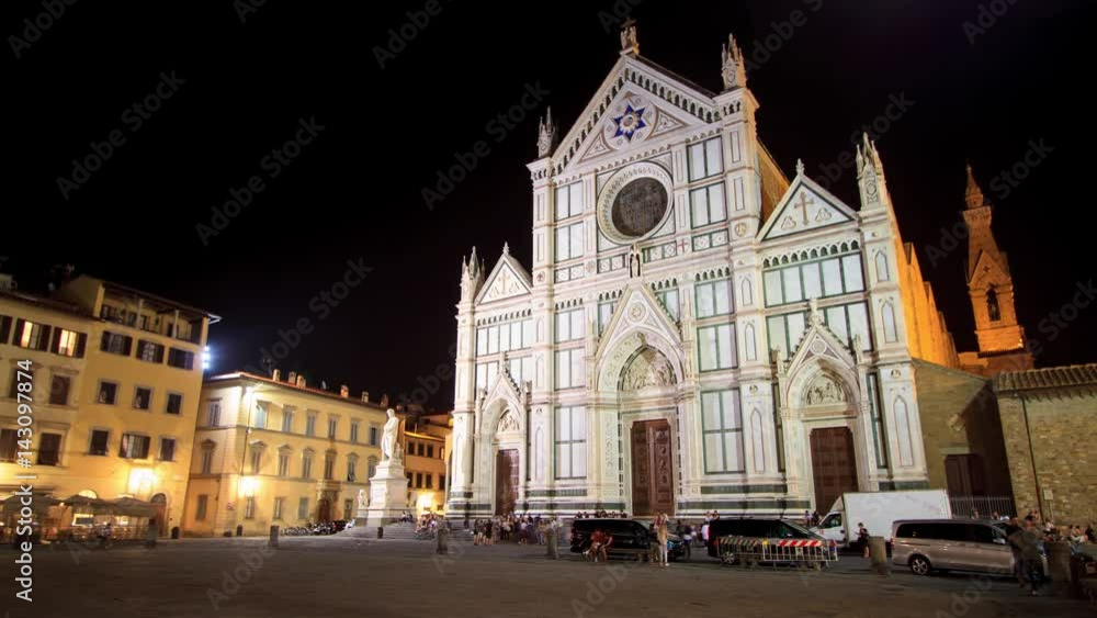 Florence, September 2016: Night view of Piazza Santa Croce and the Monument to Italian poet Dante Alighieri, the Divine Comedy writer, on September 2016 in Florence, Italy Florence, September 2016: Night view of Piazza Santa Croce and the Monument to Italian poet Dante Alighieri, the Divine Comedy writer, on September 2016 in Florence, Italy