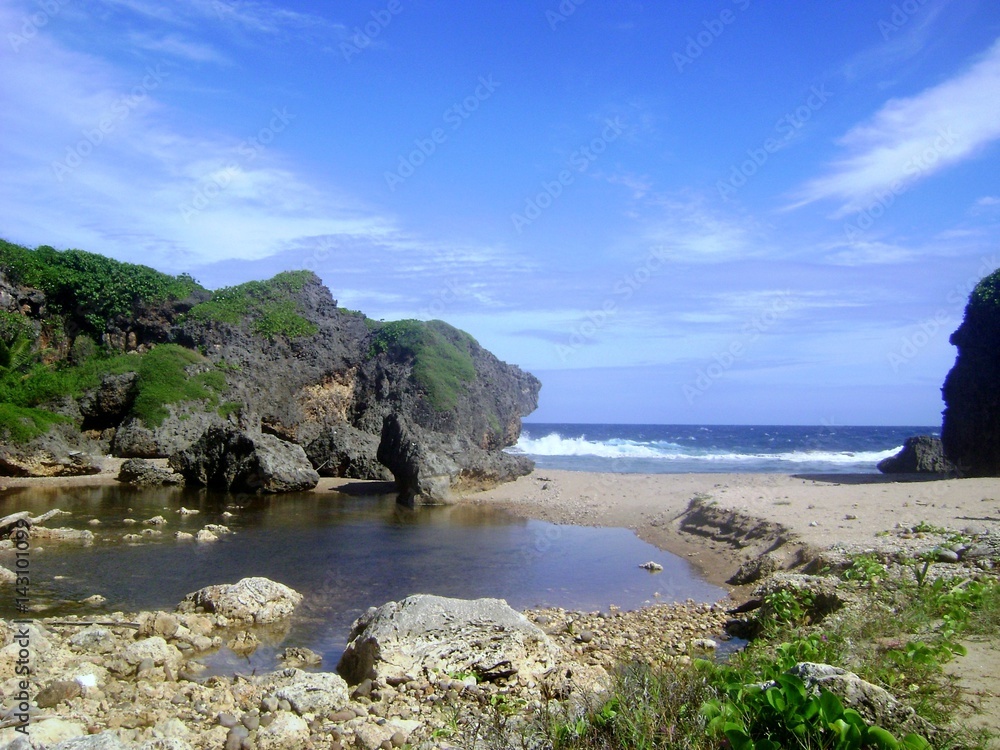 Hidden Beach, Saipan Located in Talafofo, the Hidden Beach is one of Saipan’s gems with lovely cliffs and stone formations. Hidden Beach, Saipan Located in Talafofo, the Hidden Beach is one of Saipan’s gems with lovely cliffs and stone formations.