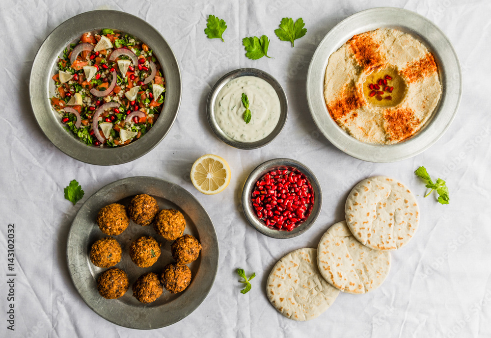 Selection of traditional Arab and Jewish food, selective focus. Healthy food, fitness, and sport diet concept.
