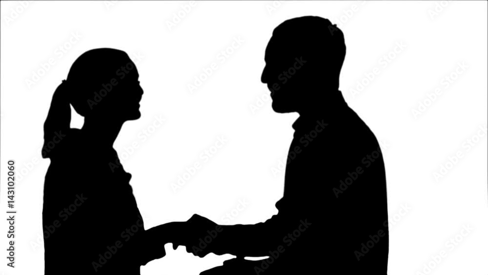 Silhouette People meet and shake hands. Silhouette People meet and shake hands.